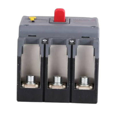A three-pole electrical circuit breaker with a gray plastic housing, black base, red top switch, and silver metal terminals.