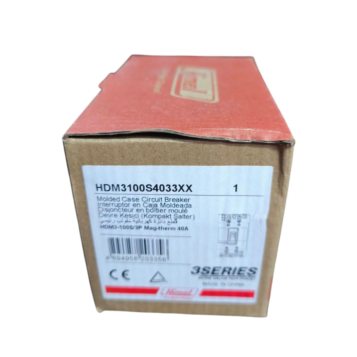 A cardboard box for a Hissar molded case circuit breaker, model HDM3100S4033XX, featuring a brown base, a reddish-brown top, and a white label with product details.
