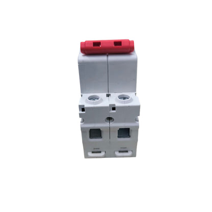 White electrical circuit breaker with red handle on a white background
