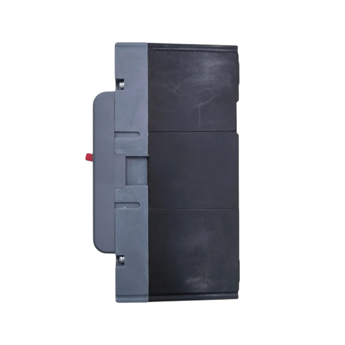 A dark gray and black rectangular electronic component or battery pack with a small red tab on the side, shown against a plain white background.