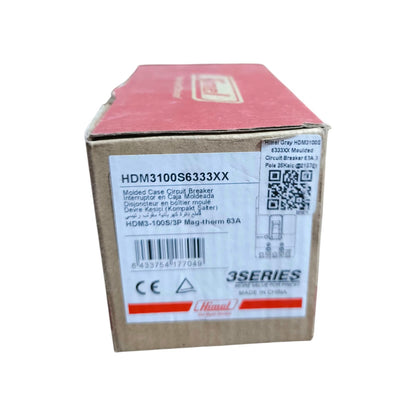A cardboard box for a Chauld 3Series HDM3100S6333XX circuit breaker, featuring a brown cardboard body, a red top flap, and a white label with product details and a barcode.