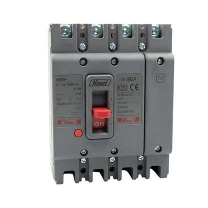 A Himmelt electrical circuit breaker with a gray plastic housing, featuring a red ON switch, terminal connections on top, and technical specifications printed on the front.
