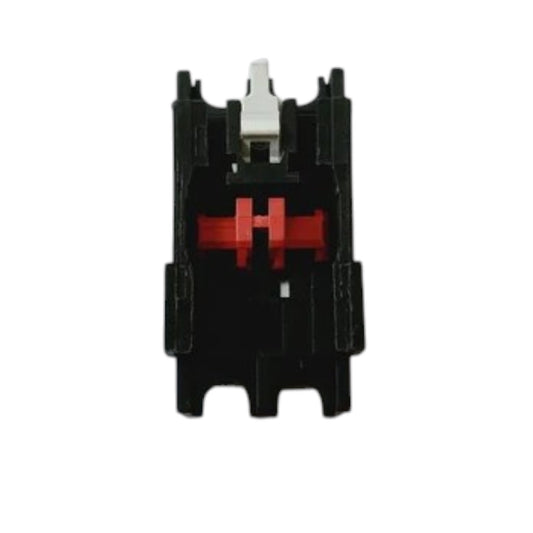 A black mechanical keyboard switch with a red H-shaped stem and a silver keycap, isolated on a white background.
