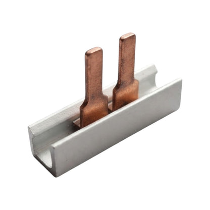 A metal electrical terminal block with two copper-colored pins, isolated on a white background.