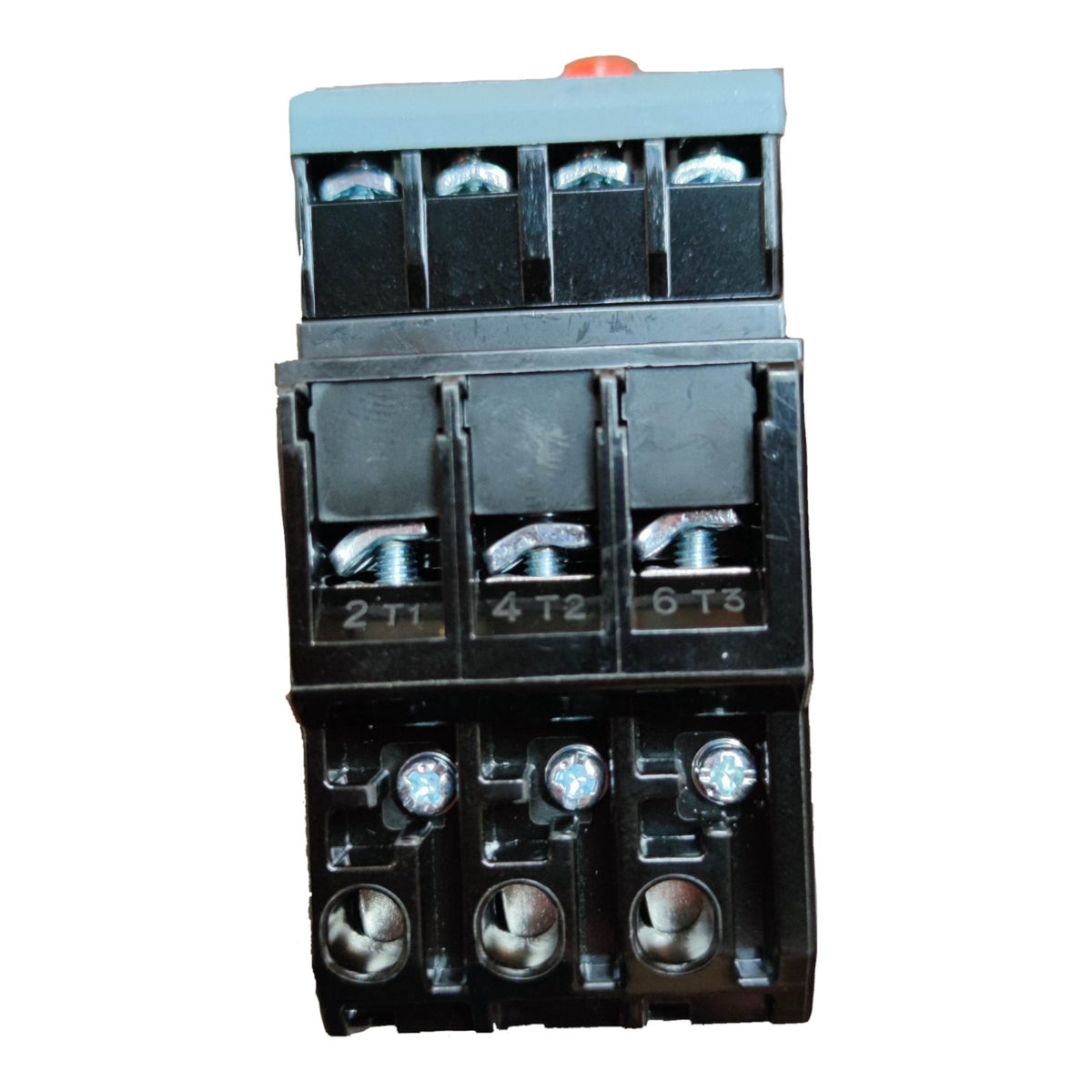 A black plastic electrical contactor with silver screw terminals and a small red button on top, isolated on a white background.