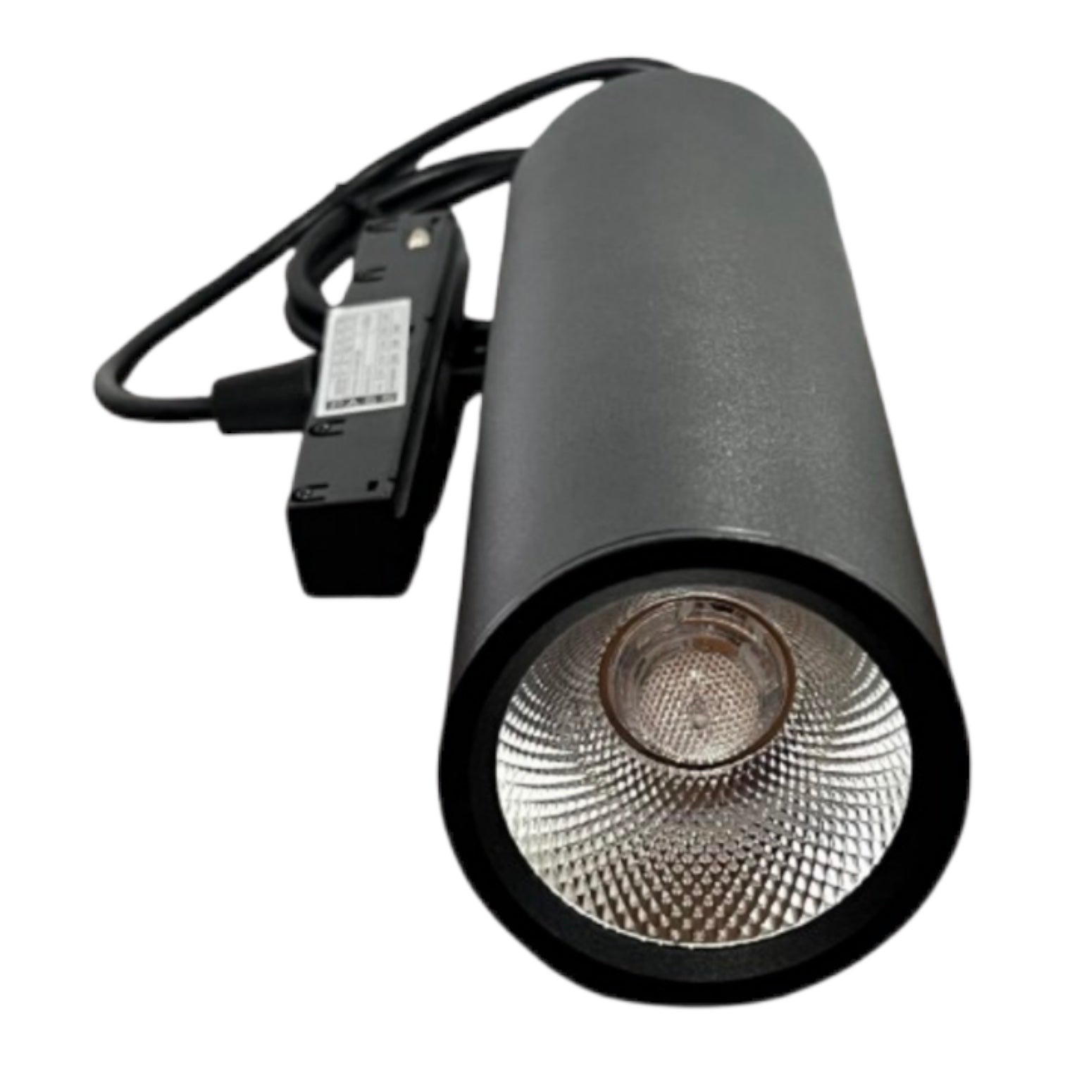 A black cylindrical track spotlight with a textured metallic silver reflector and a black power adapter with attached cable, shown on a plain white background.