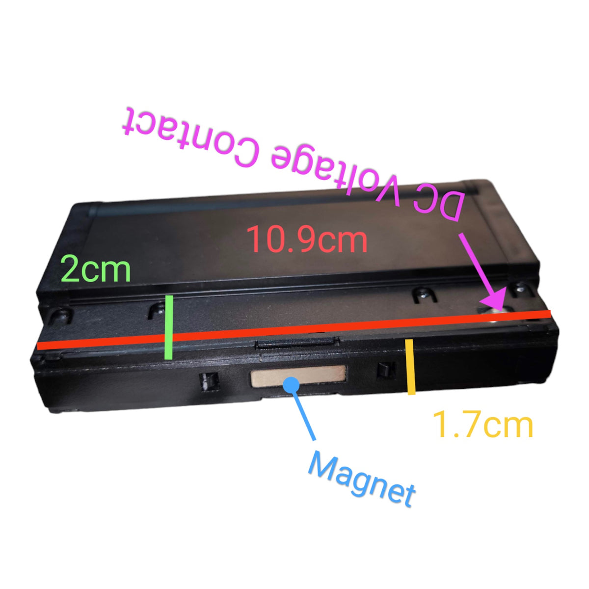 A black rectangular electronic component or battery-like device shown on a white background with overlaid measurement labels and arrows indicating dimensions: 10.9 cm, 2 cm, 1.