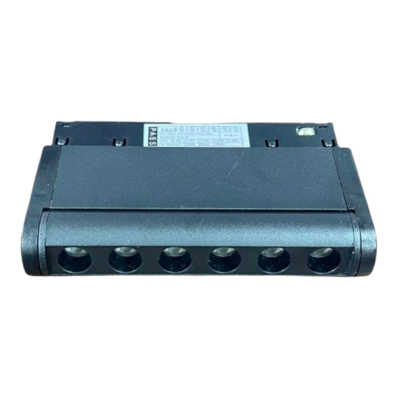 A black plastic electrical terminal block with six screw connection ports on the front face, photographed on a plain white background.