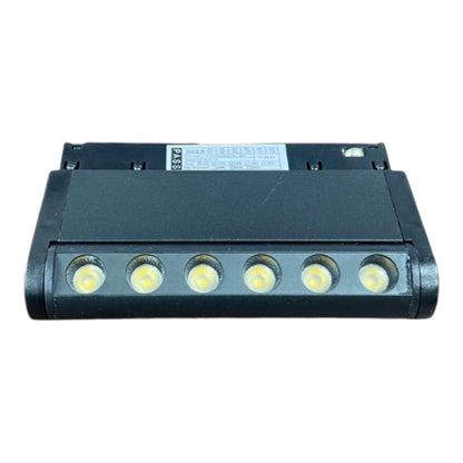 A black rectangular LED light bar with six circular LED chips visible on the front, photographed against a plain white background.
