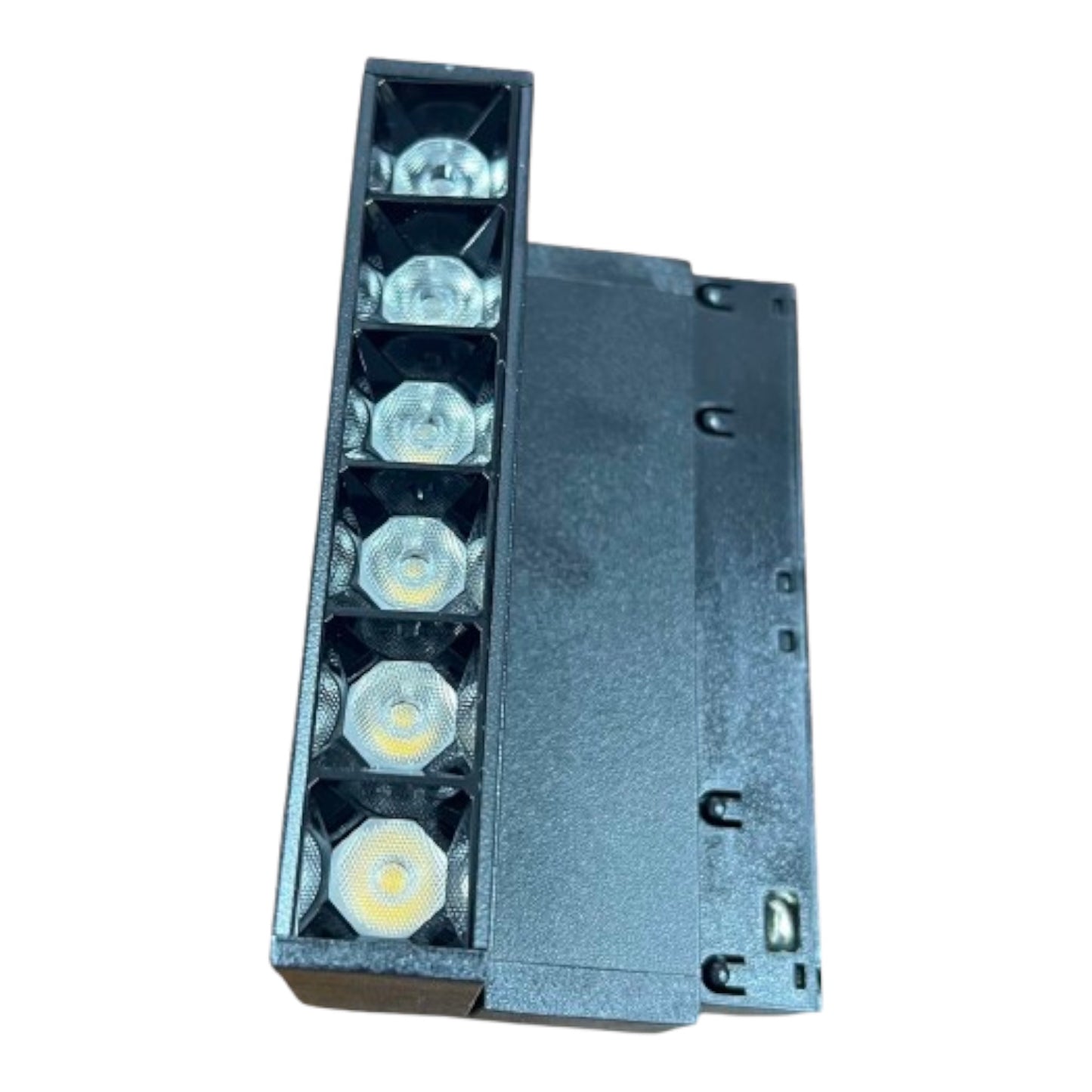 A black plastic LED light strip module with six visible hexagonal LED chips on the front, shown against a plain white background.