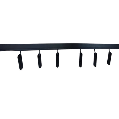 A black linear ceiling track with six evenly spaced cylindrical downlights, shown against a plain white background.