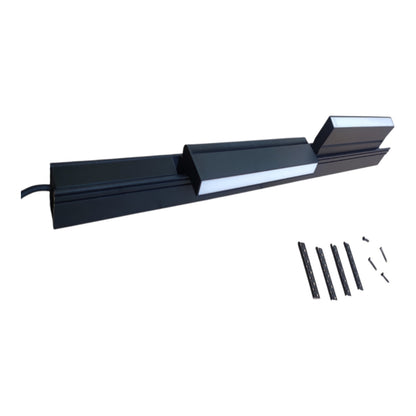 A black linear LED light bar with a silver reflective edge, shown with its mounting brackets and screws on a plain white background.