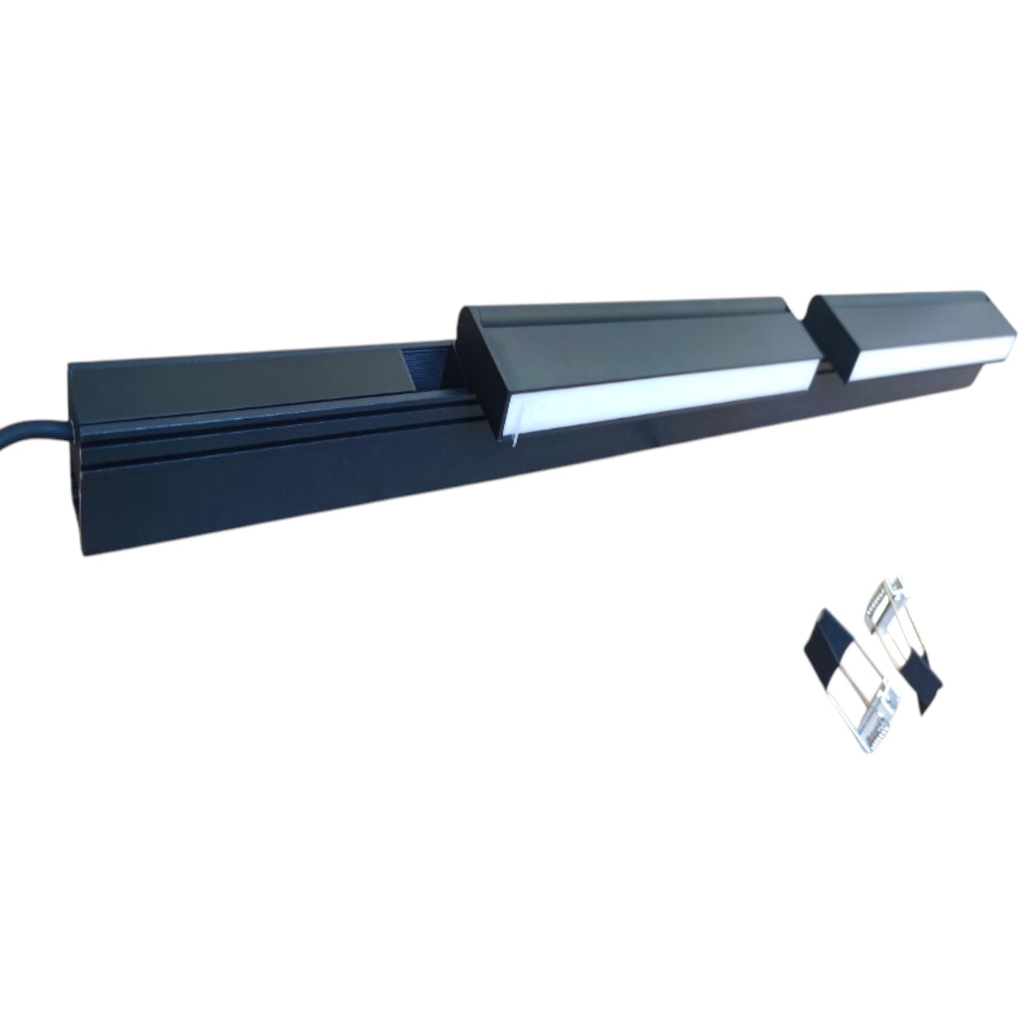 A black linear LED light bar with three adjustable segments, shown on a plain white background with a small inset of two clear mounting clips.