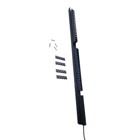 A black electronic signal conditioner or power supply with a long vertical form, shown on a plain white background with a few small mounting screws and four short black connector strips.
