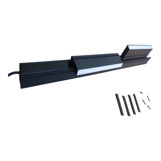 A black linear LED light bar with a silver reflective edge, shown with its mounting brackets and screws on a plain white background.