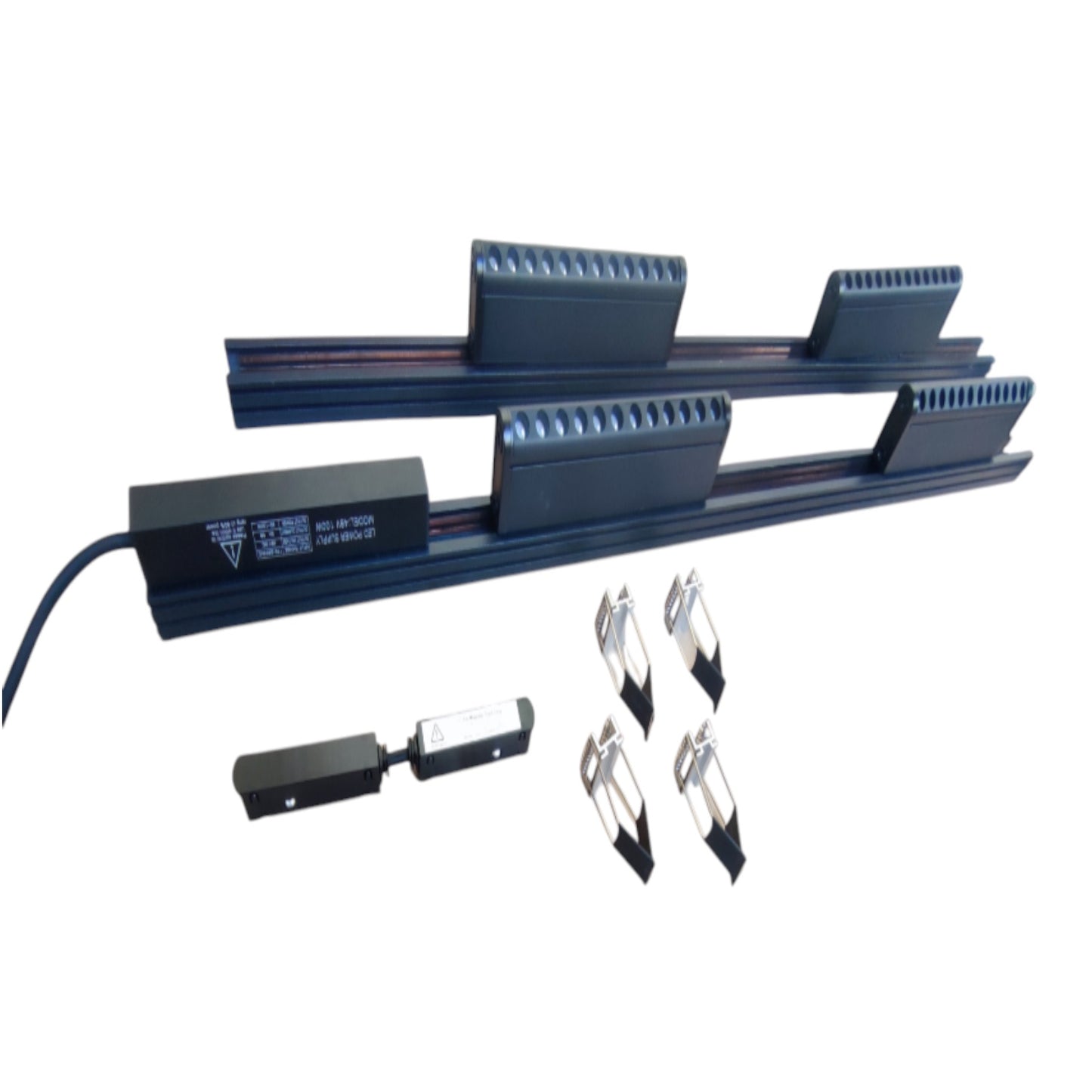 A metal track assembly with four dark blue rectangular guide blocks, a black control box with printed text, and four small silver-and-black components, shown on a plain white background.