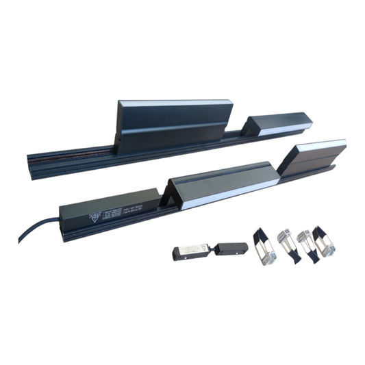 A set of black metal linear guide rails with silver-colored end caps, shown alongside several small silver and black electronic sensors or switches on a plain white background.