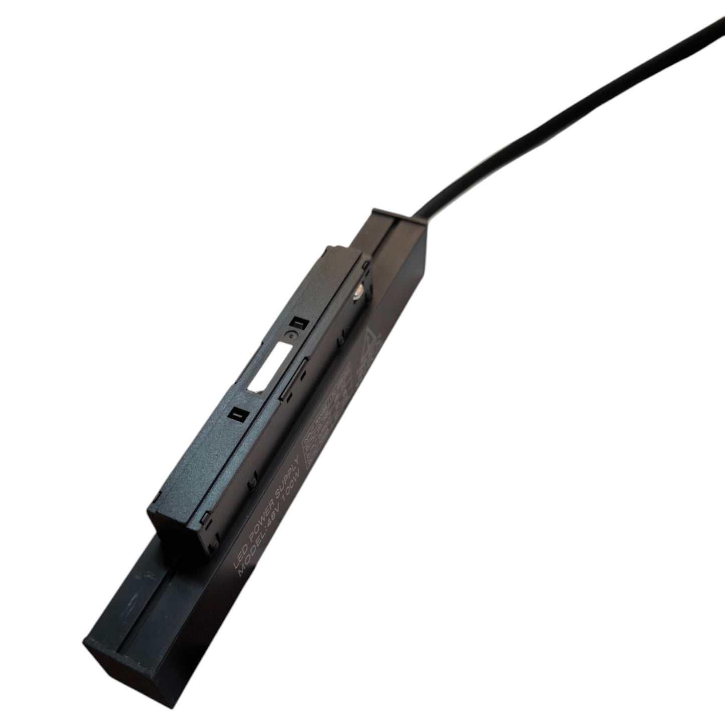 Black electronic device with a cable on a white background