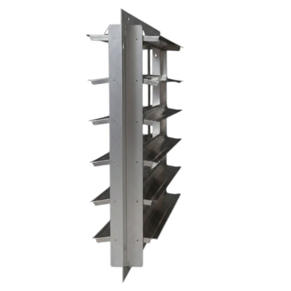 A tall, narrow stainless steel shelving unit with multiple tiers and a slatted center panel, shown on a plain white background.