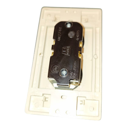 A replacement electrical light switch socket component, showing the back side with a black metal terminal plate, brass screw terminals, and a cream-colored plastic housing.