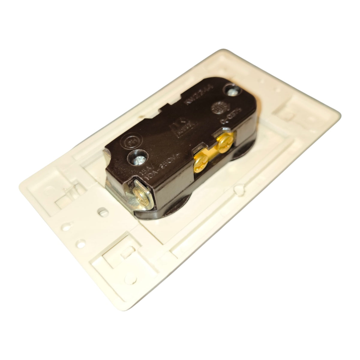 An electrical socket outlet backplate with a black terminal block, gold screw terminals, and a beige plastic housing, shown on a plain white background.