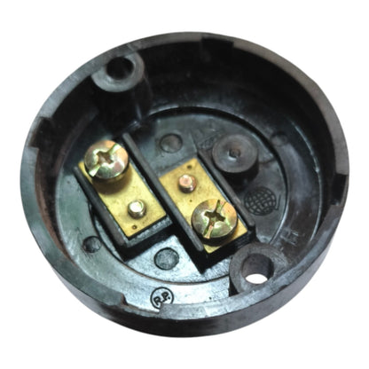 A circular black plastic electrical terminal block with two gold-colored screw terminals and mounting screws, shown on a plain white background.