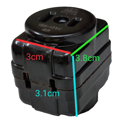 A black plastic electrical outlet cover or socket component shown on a white background with overlaid dimension lines and text labels indicating 3 cm, 3.1 cm, and 3.