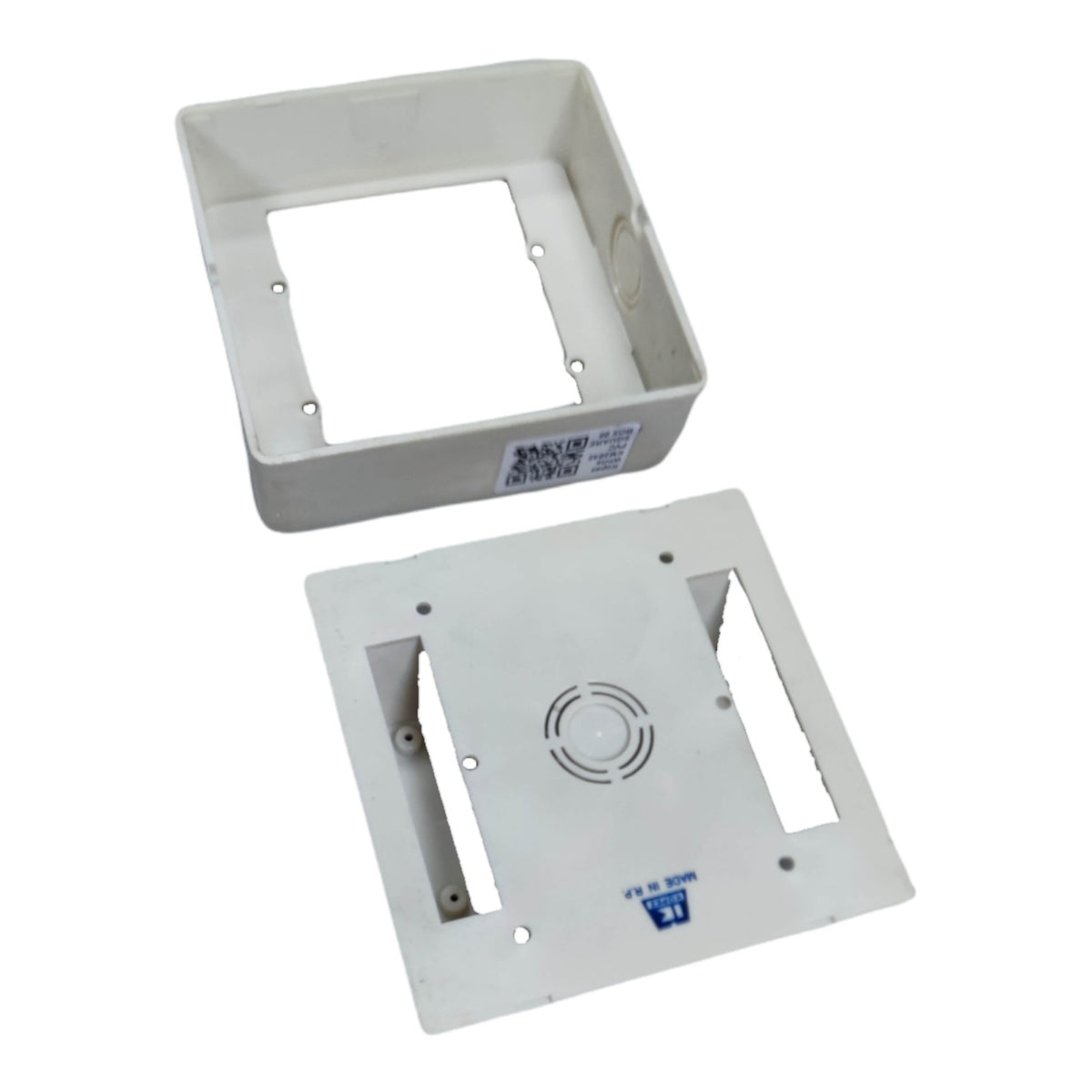 A white plastic electrical junction box cover and matching mounting plate shown on a plain white background.