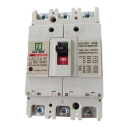 A Koten molded case circuit breaker with a beige plastic housing, featuring a central switch with an 'ON' red tab and technical specifications printed on the side.