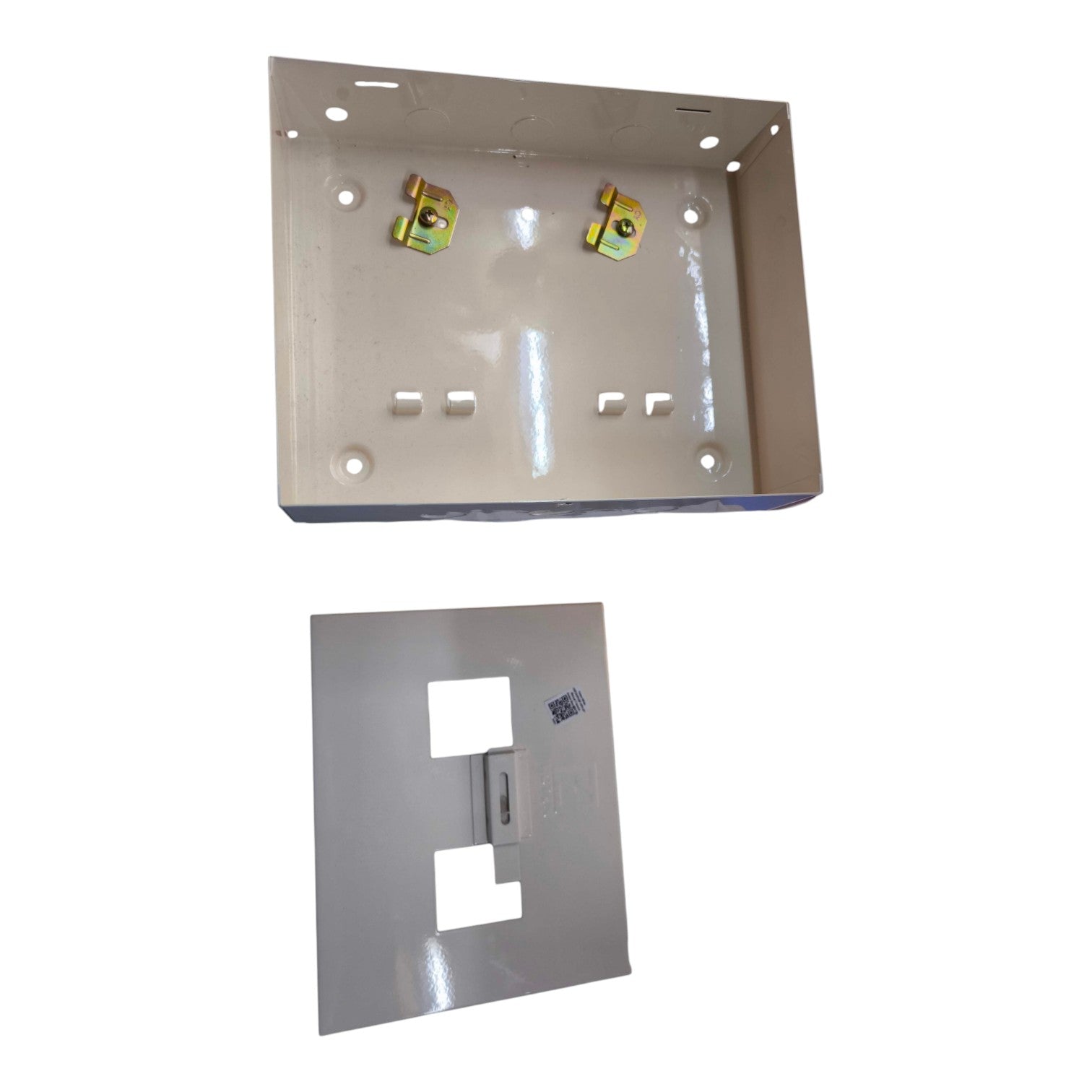 Metal wall plate and cover plate on a white background