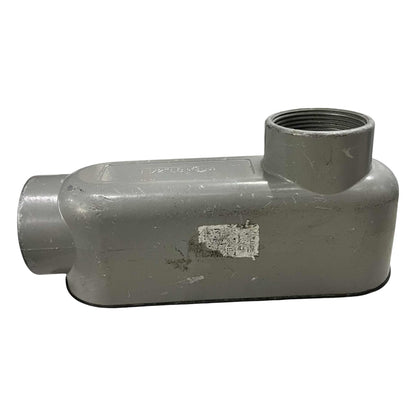 Gray metal pipe fitting on a white background