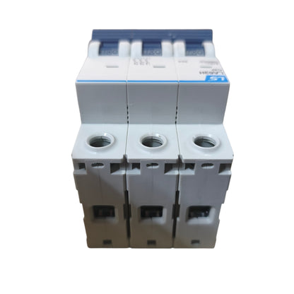 A three-pole modular circuit breaker module with white plastic housings, blue top handles, and a blue brand label, shown on a plain white background.