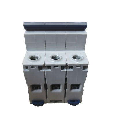 A three-phase modular electrical component, likely a circuit breaker or terminal block, featuring a light gray plastic body with dark blue accents on the top handle and bottom feet, set against a plain white background.