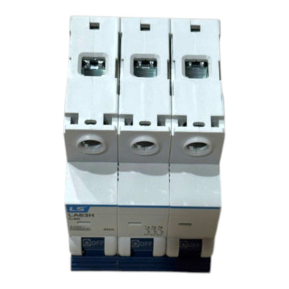 Three modular white circuit breakers stacked vertically, featuring blue accents and a blue base, photographed against a plain white background.