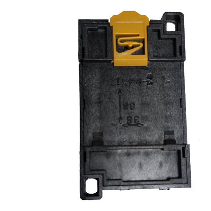 A black plastic electrical component or connector housing with a yellow locking tab on top, photographed against a plain white background.