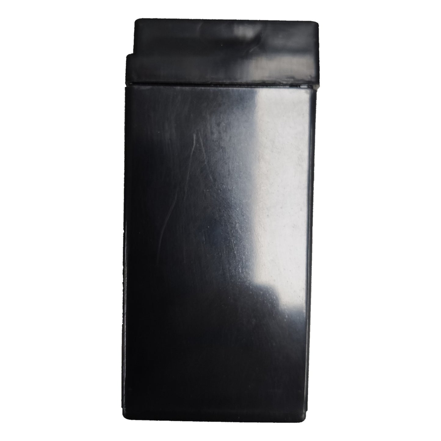 Black rectangular object with a reflective surface on a white background