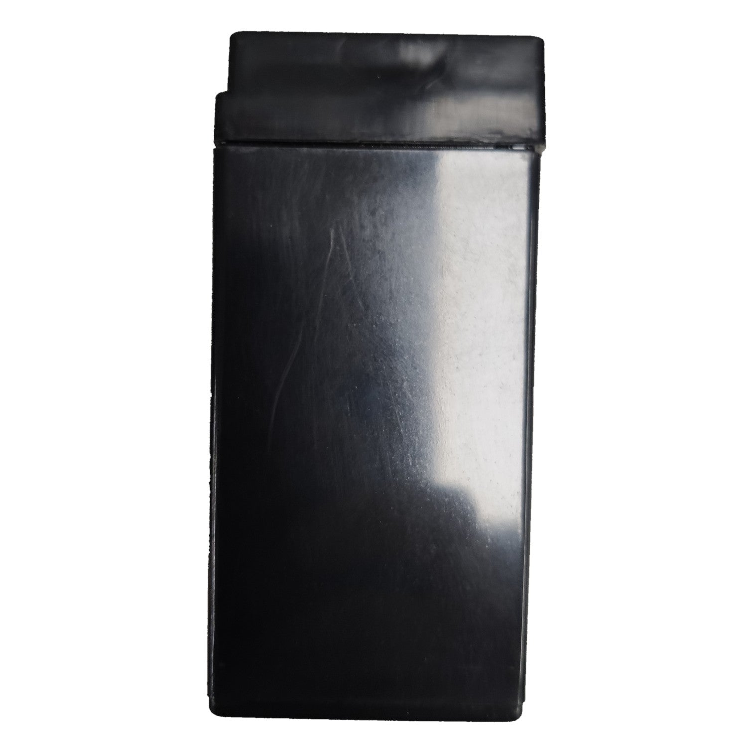 Black rectangular object with a reflective surface on a white background