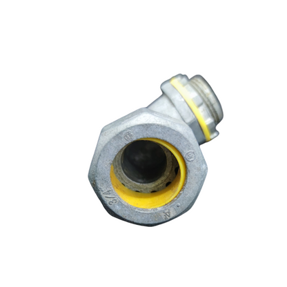 Metal fitting with yellow interior on a white background