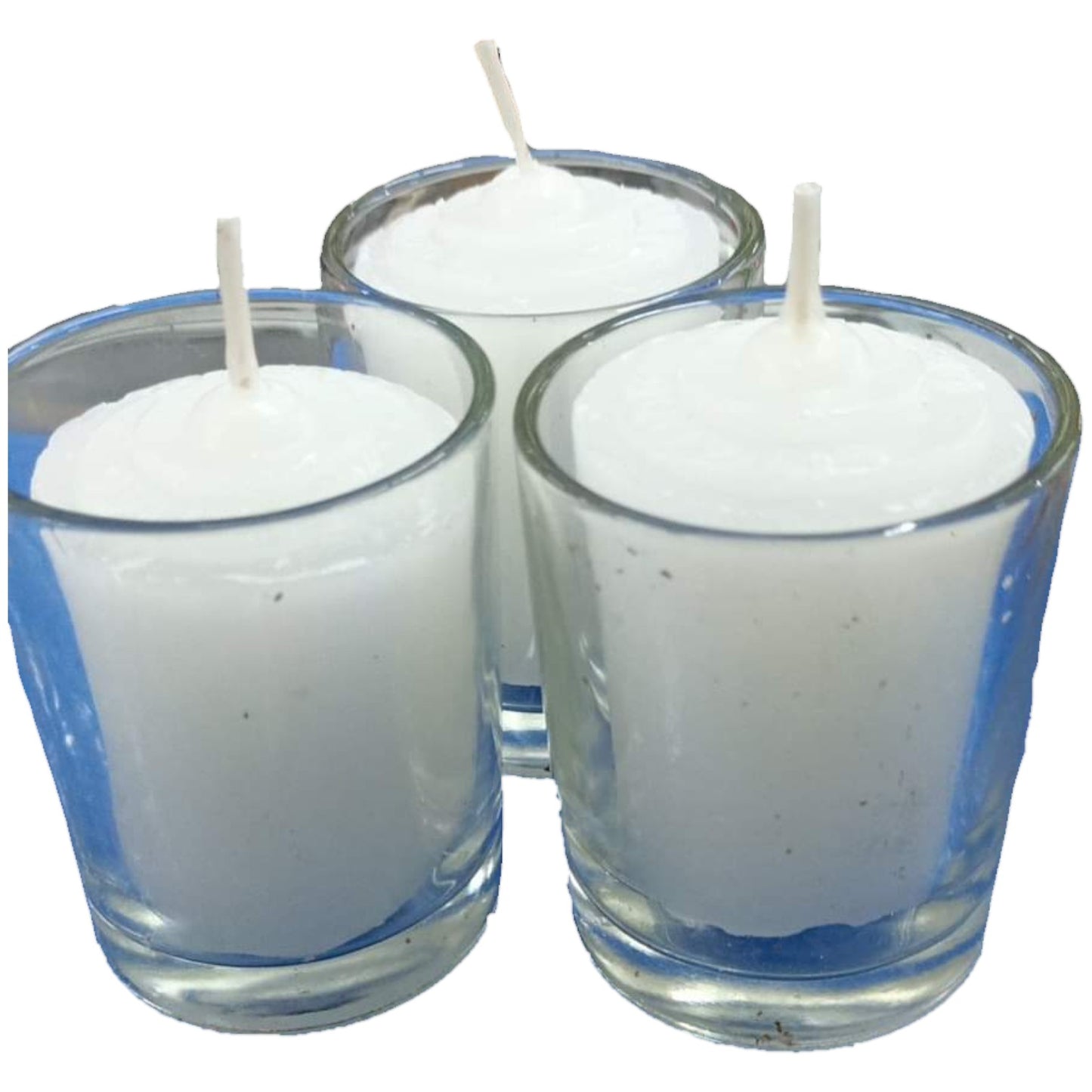 Three small white candles in blue glass holders on a white background