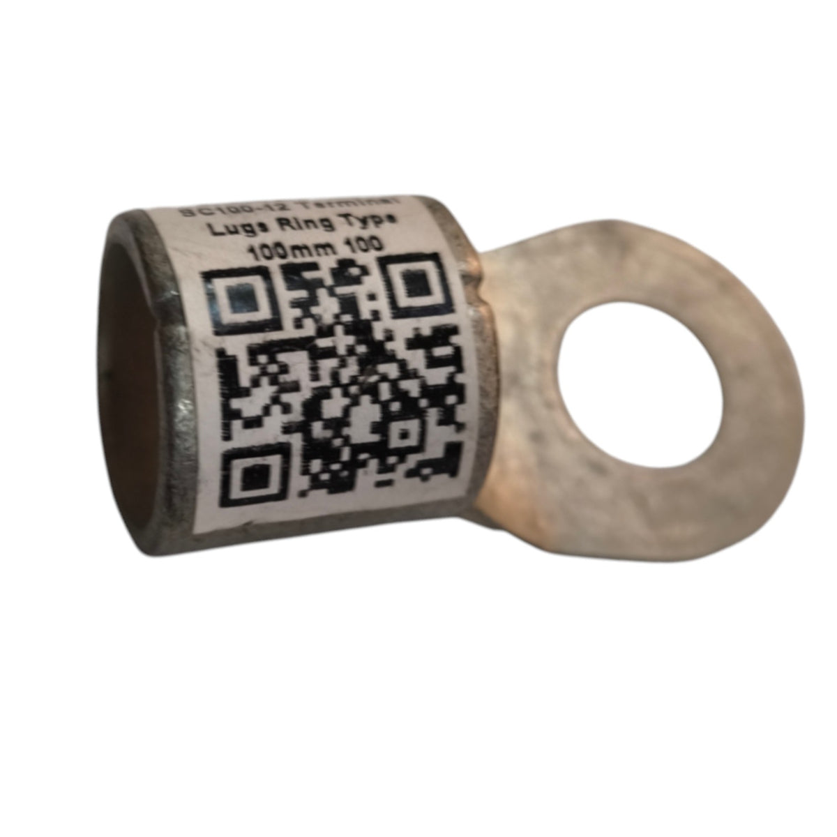 A metal lug ring with a circular terminal and a cylindrical body printed with a label showing a QR code and text reading 'Lugs Ring Type 100mm 100'.