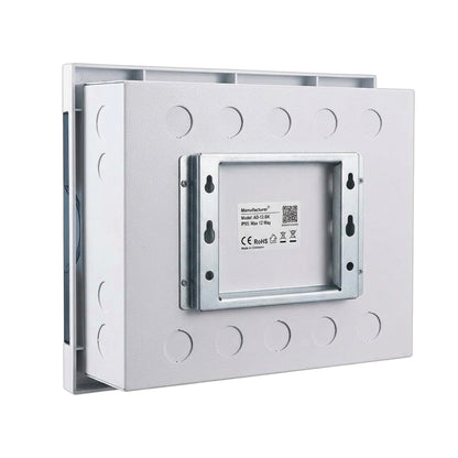 A silver metal mounting bracket or enclosure plate with circular cutouts and a central recessed panel showing a small product label, photographed on a plain white background.