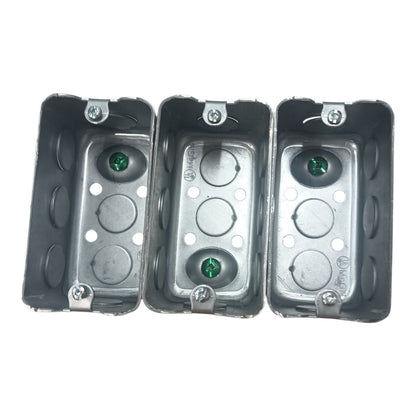 Three gray metal electrical junction boxes shown side-by-side on a plain white background.