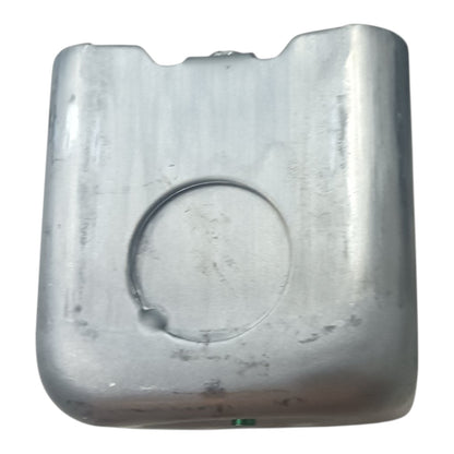 A used silver metal fuel tank with a circular cutout on the front, shown against a plain white background.