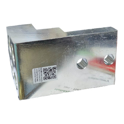 Metal component with a QR code label on a white background