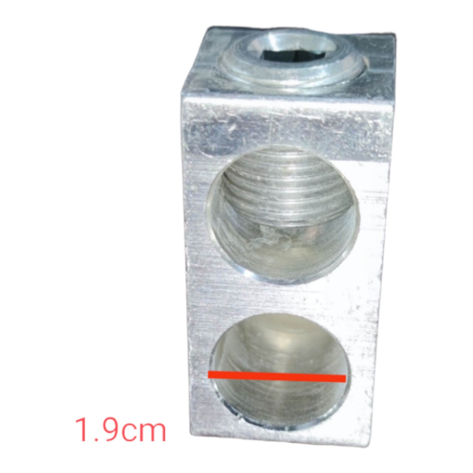 Metal block with three cylindrical holes on a white background