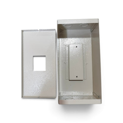 A silver metal electrical junction box with its front cover removed, showing the interior mounting bracket and screw holes, set against a plain white background.