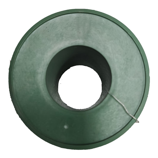 A dark green plastic ring-shaped component with a central hole, shown against a plain white background.