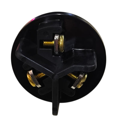 Black mechanical component with gold screws on a white background