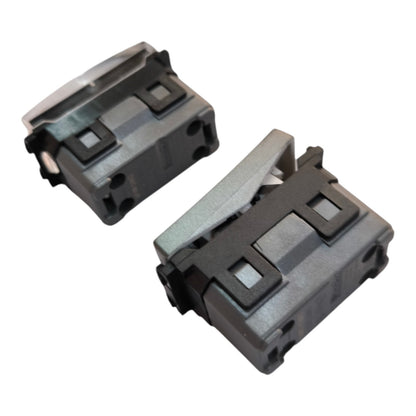 Two dark gray plastic electrical connector components shown on a plain white background.