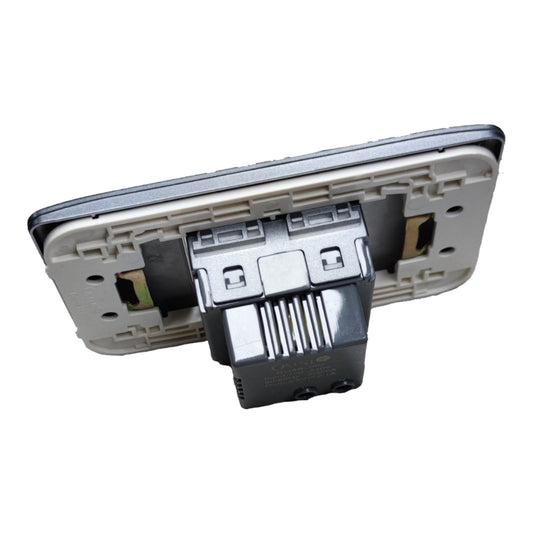 A replacement rear-view mirror assembly for a vehicle, featuring a light gray plastic mounting plate and a black plastic central connector module, shown on a solid white background.
